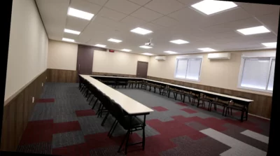 Sala formato U com mesa